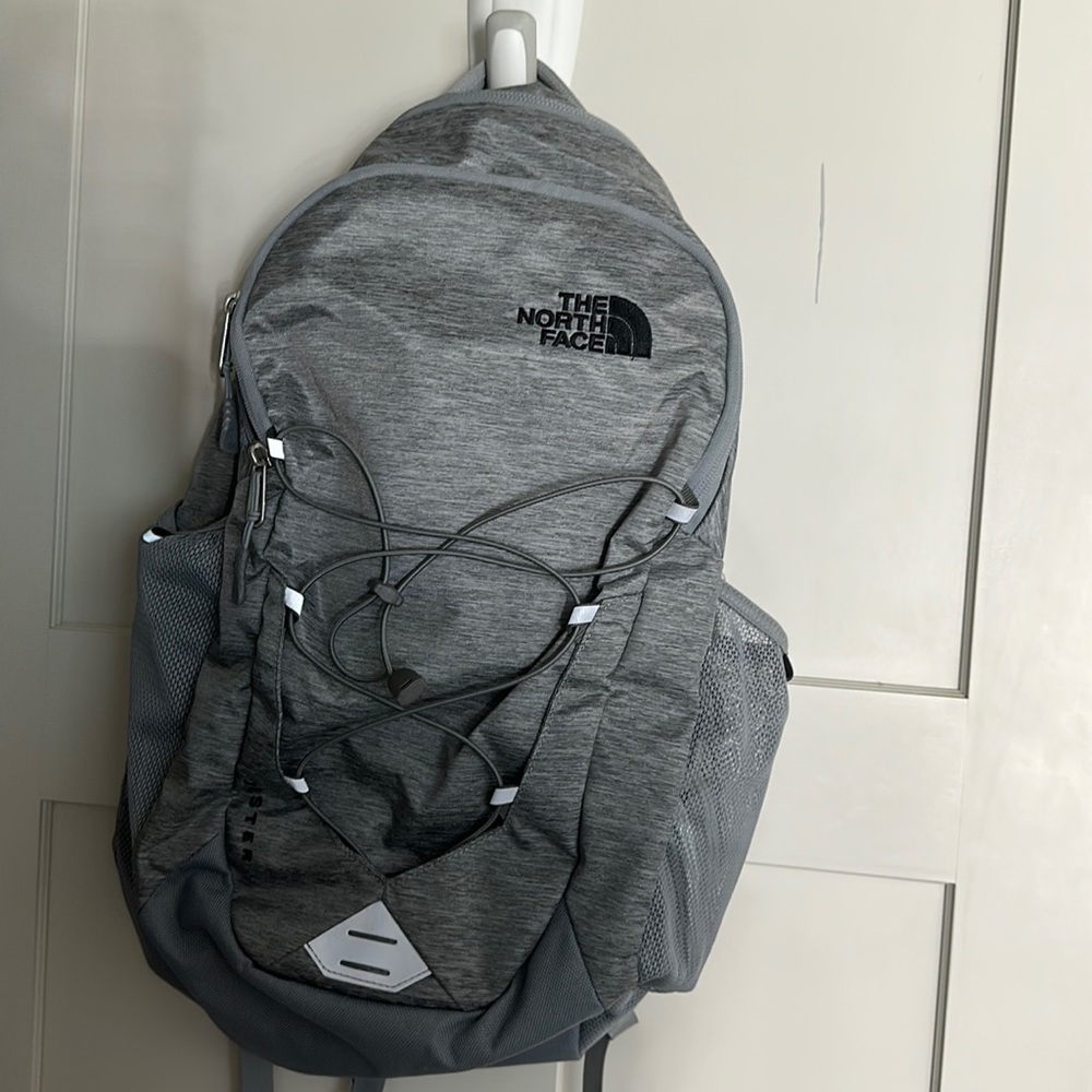 brand new never used the north face grey backpack